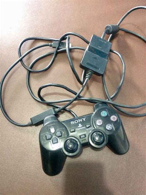 Sony Playstation Controller with PC Adapter, Hobbies & Toys, Toys & Games on Carousell