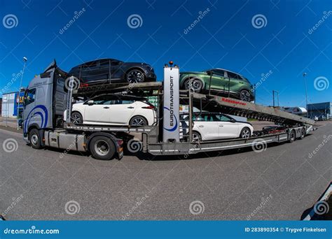 Large Truck Loaded with New Cars Ready for Delivery.. Editorial Stock ...