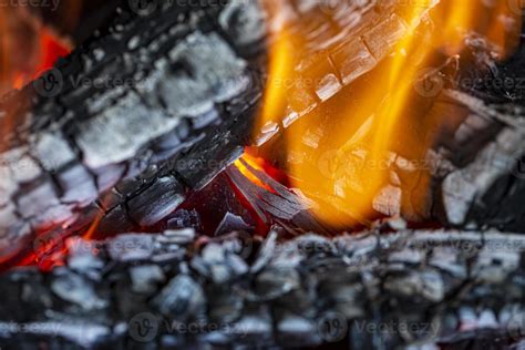 Burning log of wood in a fireplace close-up. 5392503 Stock Photo at Vecteezy