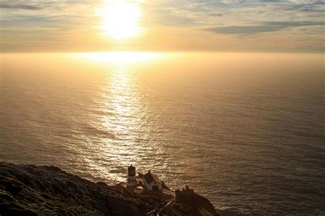 Little Lighthouse Big Sunset Photograph by Bonnie Follett - Fine Art America