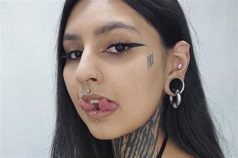 'Real-life VAMPIRE' with 49 body modifications warns others thinking about following her - World ...