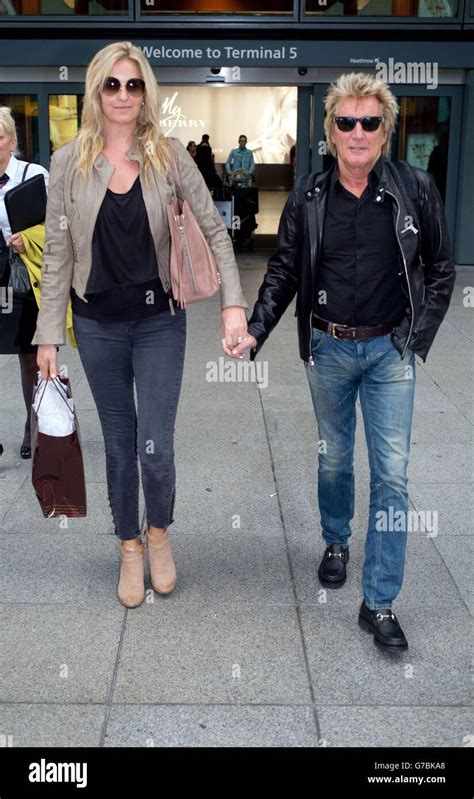 Rod Stewart and his wife Penny Lancaster arrive at Terminal 5 of ...