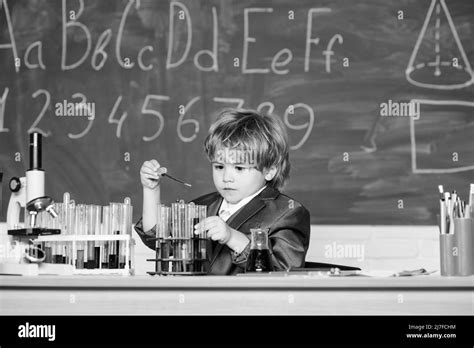 biology science. science experiments with microscope in lab. school kid ...