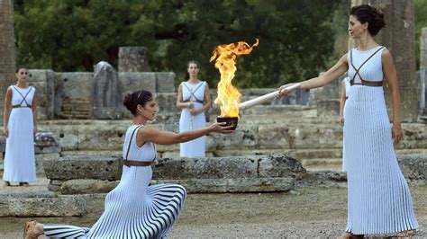 Olympic Torch Relay Suspended in Greece Due to COVID-19 | Swimmer's Daily