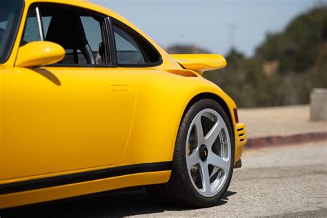 Ruf CTR Yellow Bird ruffles 911 feathers - CNET