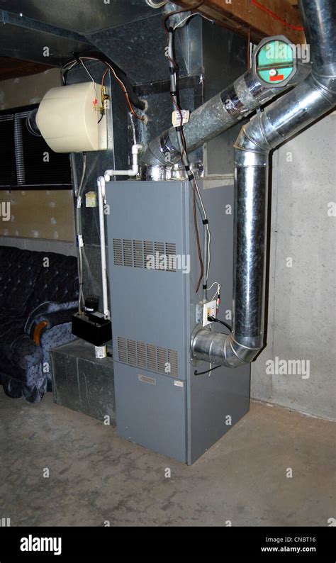 A residential oil furnace - forced hot air with central air Stock Photo: 47588834 - Alamy