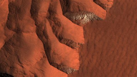 Ice Peeks out of a Cliffside on Mars - Universe Today