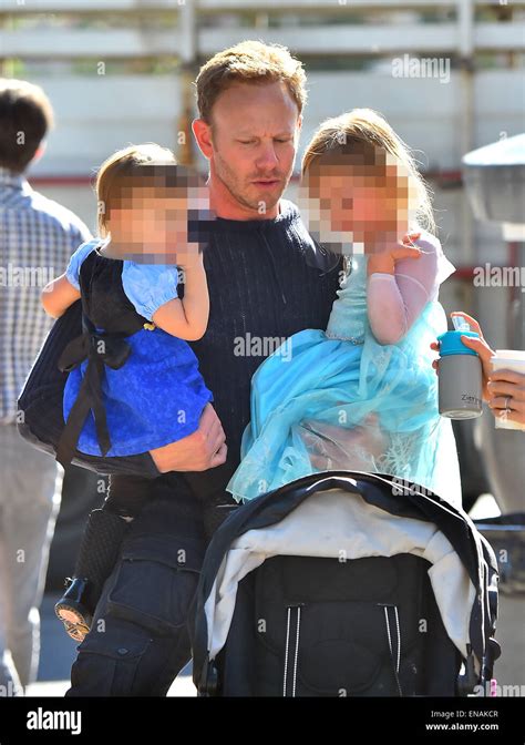 Ian Ziering and his two daughters play with the rabbits at the Farmer's Market Featuring: Ian ...