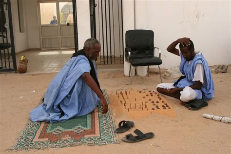 What is the African board game in this picture? - Board & Card Games Stack Exchange