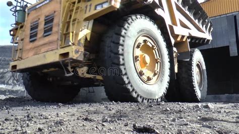 Mining, quarry, dump truck stock footage. Video of brown - 173185384