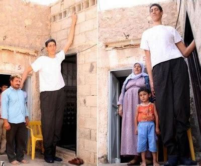 Curious, Funny Photos / Pictures: 8'1" (2.47 meter) Sultan Kosen from Turkey takes title of ...