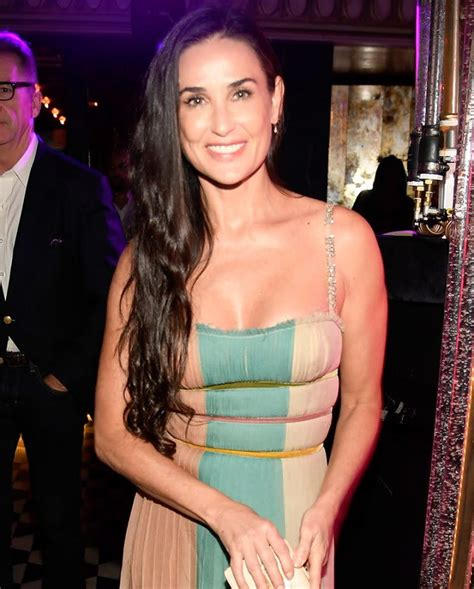 Demi Moore Reveals She’s Missing Her Two Front Teeth