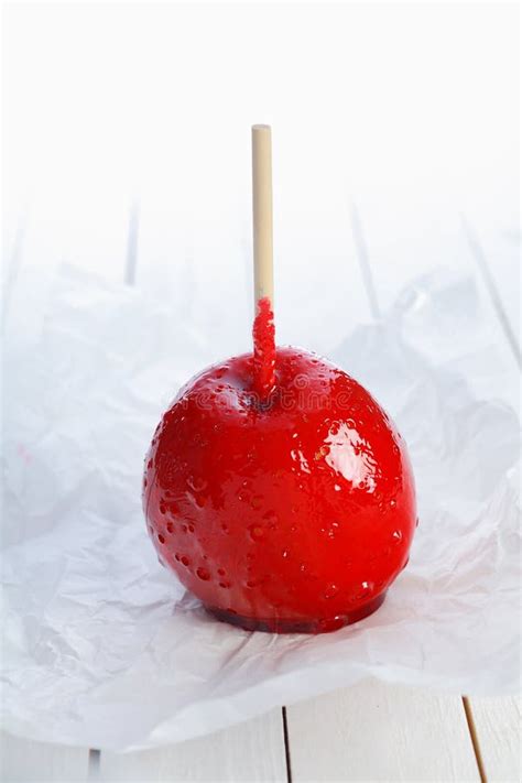 Colourful Toffee Apple on a Stick Stock Image - Image of diet, stick: 31589443