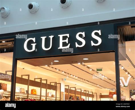 Funchal, Portugal - Oct 23, 2021: Guess store sign. Guess is an ...