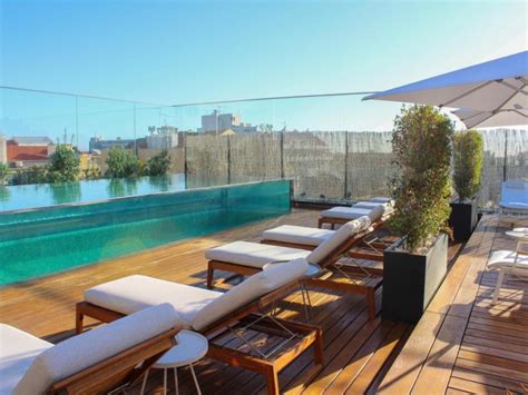 The 7 Best Hotels In Lisbon With a Rooftop Swimming Pool