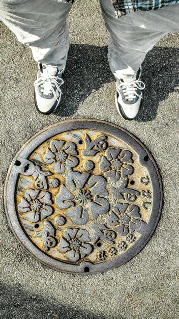 Premium Photo | Manhole cover art