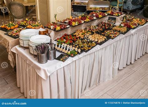 Catering buffet table stock photo. Image of decoration - 172376878