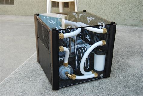 an ultra compact water-cooled ITX build. this must have taken a ton of ...