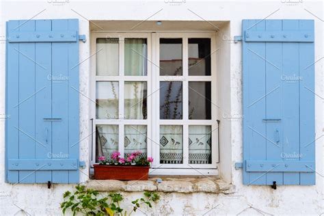 Window with blue painted shutters | Green shutters, Painting shutters ...