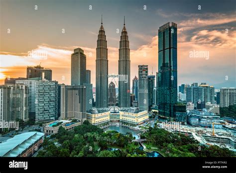 City skyline with Petronas Towers at sunset, Kuala Lumpur, Malaysia Stock Photo - Alamy