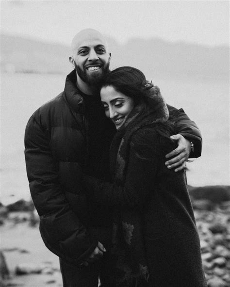 Couple in a warm embrace during their engagement session