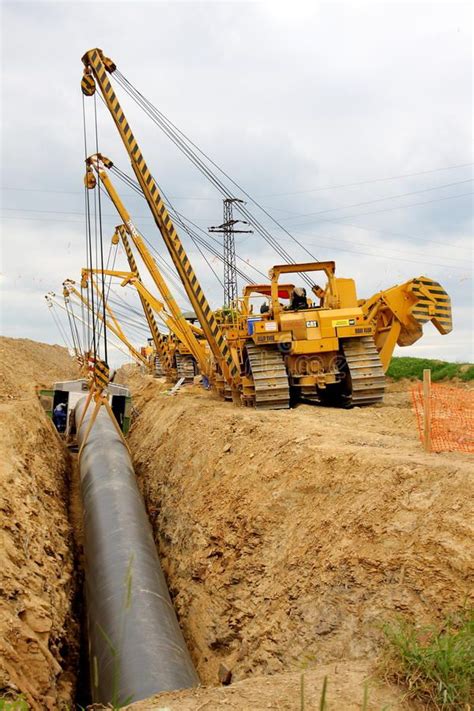 Cranes laying gas pipeline. Construction of an international gas pipeline Gazela , #Aff, # ...