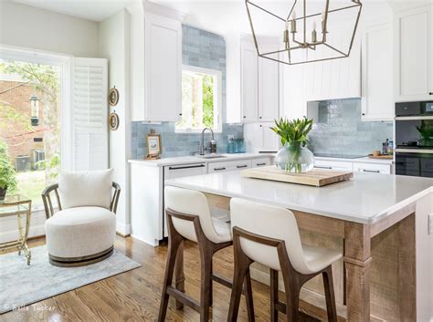 This Coastal Kitchen By Caren Rideau Features A Juice Bar And Glass Front Cabinets | lupon.gov.ph