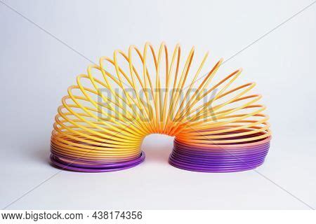 Popular Plastic Slinky Image & Photo (Free Trial) | Bigstock