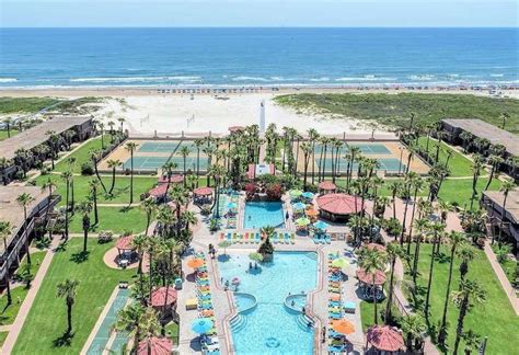 an aerial view of the pool and tennis courts at ocean isle resort in destinia, florida