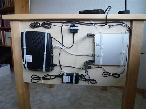 Decluttering wires. A peg board behind the table. Excellent. Source: http://www.reddit.com/r/d ...