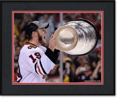 Jonathan Toews Raising The Stanley Cup | Chicago Blackhawks Framed Print