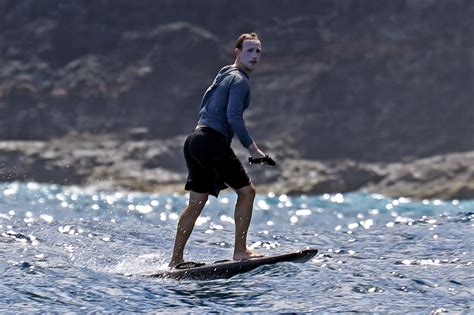 Mark Zuckerberg surfboards in Hawaii with way too much sunscreen