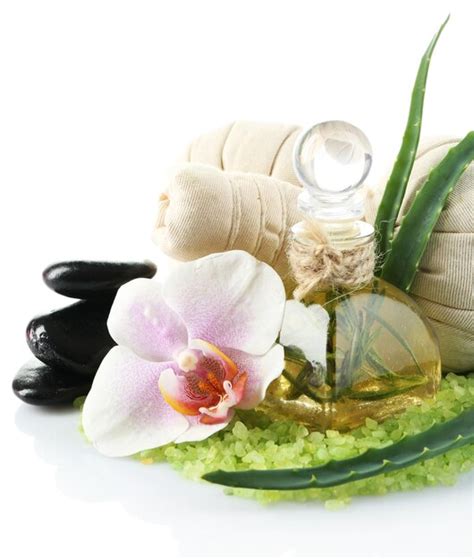 Premium Photo | Spa treatments with orchid flower isolated on white