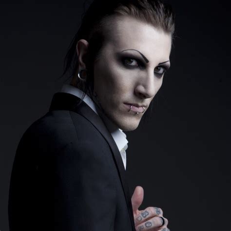 Chris motionless in a suit