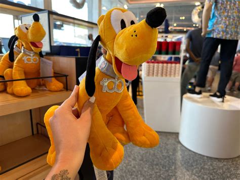 Celebrate Disney100 With This Adorable Pluto Plush! - MickeyBlog.com