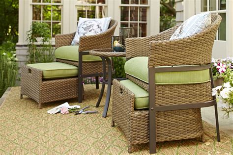 This patio conversation set is perfect for small spaces. Push the ottomans underneath the seats ...