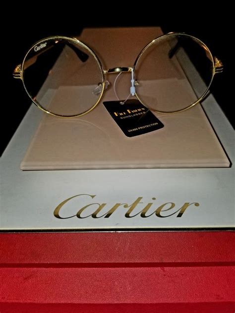 Cartier clear round specs very classy blk and gold accents for Sale in ...