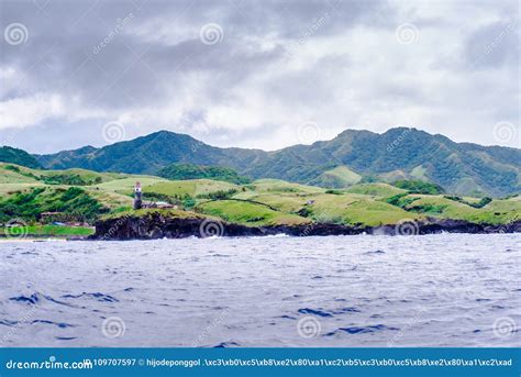 Hills of Sabtang Island with Lighthouse Fronting the Shore at, Batanes ...