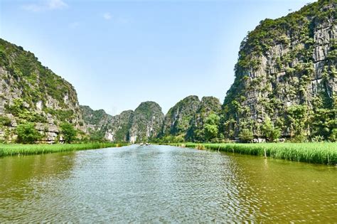 Boat ride in Tam Coc stock photo. Image of cliffs, padi - 238643798