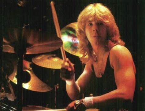 Clive Burr, Original Iron Maiden Drummer, Dies At 56