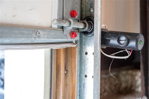 Garage Door Safety Sensors: Troubleshooting & Testing Tips