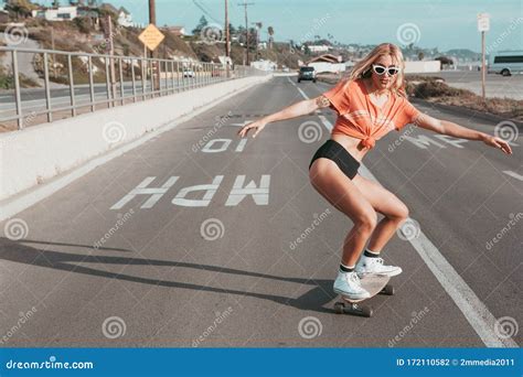 Skater Girl Skating on Street in Malibu. Stock Photo - Image of ...