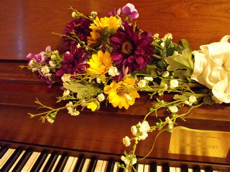 Piano Flowers Photograph by Penny Homontowski