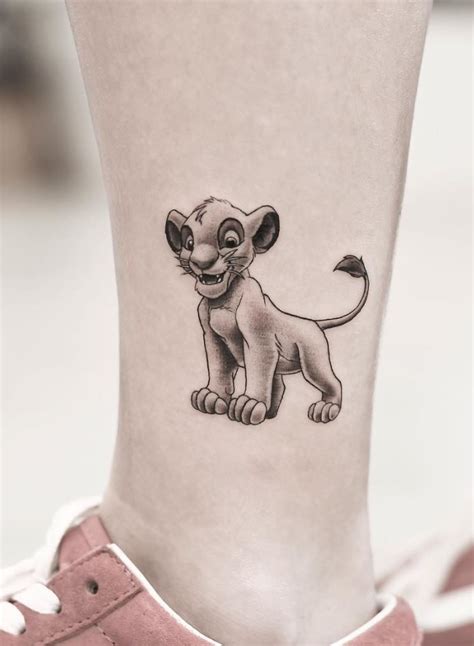 Simba From The Lion King Tattoo - TattMania | Lion king tattoo, King ...