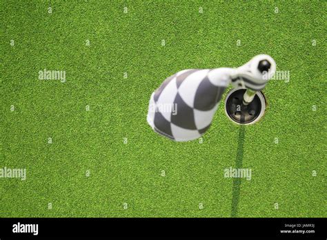 golf hole flag on a field Stock Photo - Alamy