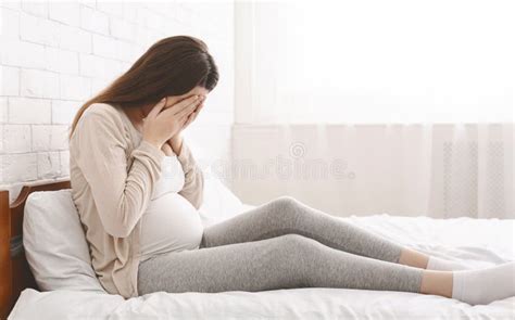 Young Pregnant Woman Feeling Sad and Crying at Home Stock Image - Image ...