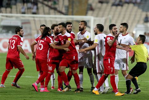 War-torn Syria keep historic football dream alive after draw with Iran ...