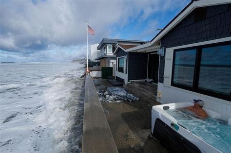 Massive waves on California coast cause flooding, force evacuations ...