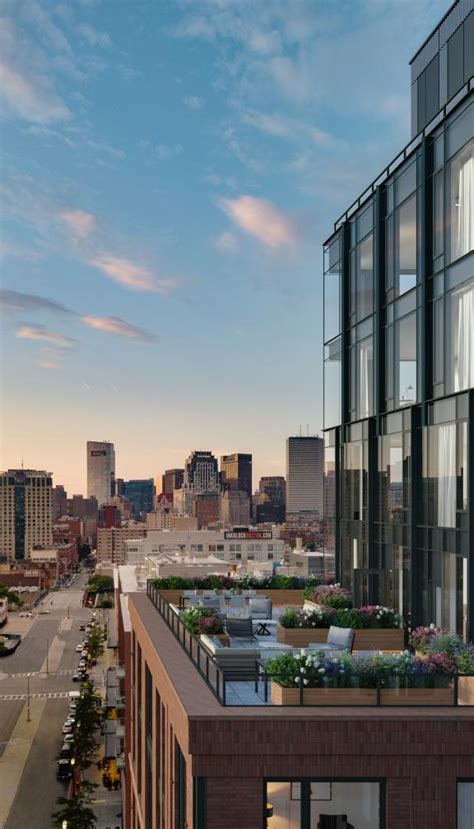 Views from The Quinn of the Boston skyline and one of the Quinn's rooftop patios