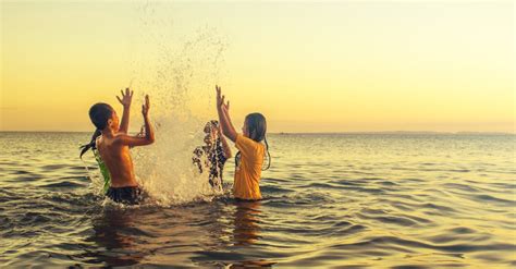 Group of People Playing on the Beach · Free Stock Photo